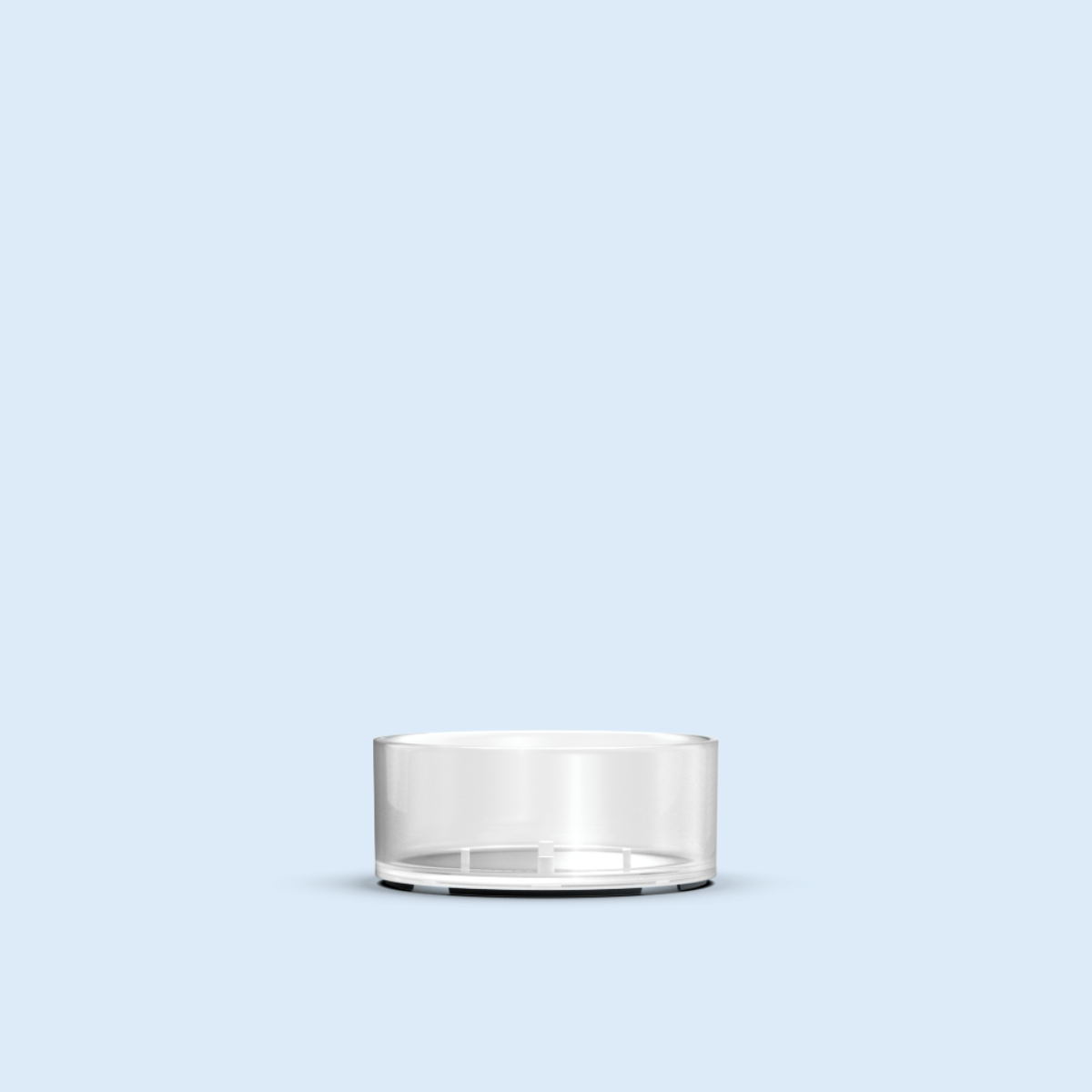 clear Mini Tea Light plastic candle container on light blue background